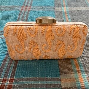 Elegant Tan Clutch with Gold Accents